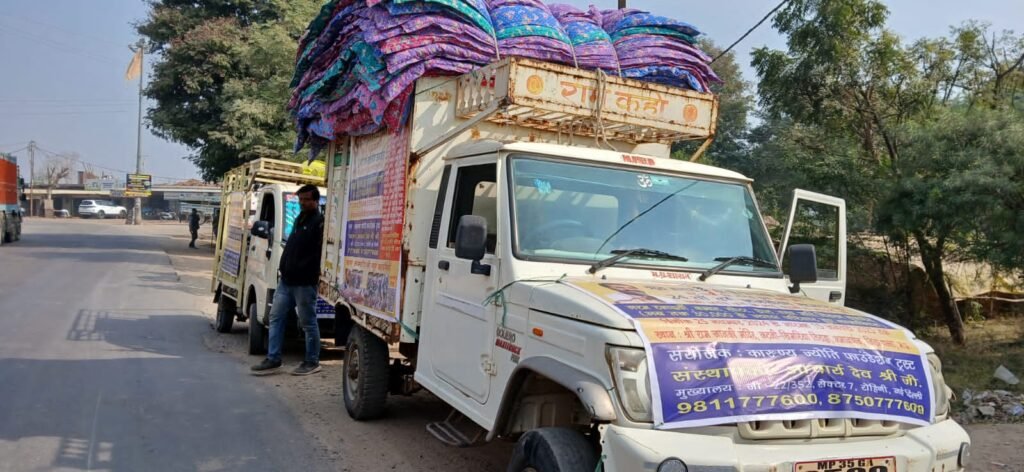 Truck loaded with blankets and supplies for tribal regions.